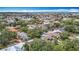 Panoramic aerial view of a residential area with waterfront properties and beautiful blue sky at 4420 Marine Pkwy, New Port Richey, FL 34652