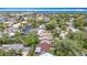 An aerial view showcasing waterfront homes with boat access along canals with direct access to the ocean at 4420 Marine Pkwy, New Port Richey, FL 34652