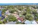 Scenic aerial shot of a waterfront community with boat docks, lush greenery, and attractive residential properties at 4420 Marine Pkwy, New Port Richey, FL 34652