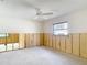 Bedroom ready for renovation featuring ceiling fan, window and natural light throughout at 4420 Marine Pkwy, New Port Richey, FL 34652