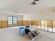 Bright space featuring wall studs and a window overlooking the outdoors at 4420 Marine Pkwy, New Port Richey, FL 34652