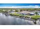 Aerial view of the Gulf Harbour Yacht Club on the water, featuring boat docks and waterfront access at 4420 Marine Pkwy, New Port Richey, FL 34652