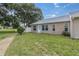 This home has a cozy backyard with a grassy area at 4837 Boonesboro Ct, New Port Richey, FL 34655
