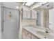 Bathroom featuring vanity and glass shower at 4837 Boonesboro Ct, New Port Richey, FL 34655