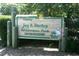 Entrance sign to Jay B. Starkey Wilderness Park, Pasco County with a raccoon graphic at 4837 Boonesboro Ct, New Port Richey, FL 34655