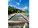 Enjoy a friendly game of bocce ball on this well-maintained court with benches and shade at 4903 Myrtle Oak Dr # 12, New Port Richey, FL 34653