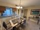 Cozy dining room with views into the kitchen at 4903 Myrtle Oak Dr # 12, New Port Richey, FL 34653