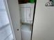 Convenient stacked washer and dryer unit neatly tucked away in a closet within the home at 4903 Myrtle Oak Dr # 12, New Port Richey, FL 34653