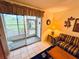 Screened-in patio offering serene views of lush greenery, providing a peaceful outdoor space at 4903 Myrtle Oak Dr # 12, New Port Richey, FL 34653