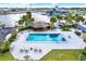 Enjoy this outdoor pool with comfortable lounging area and views of the waterfront at 4939 Floramar Ter # 204, New Port Richey, FL 34652