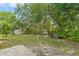A view of a mostly shady backyard at 5216 Hope Ln, Spring Hill, FL 34606