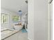 Modern bathroom with soaking tub and glass-enclosed shower at 5216 Hope Ln, Spring Hill, FL 34606