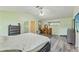 Spacious primary bedroom with vaulted ceiling and walk-in closet at 5216 Hope Ln, Spring Hill, FL 34606