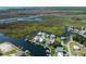 Waterfront community featuring private docks and tranquil canal access, surrounded by natural beauty and serene views at 5234 Foxhall Ct, Weeki Wachee, FL 34607
