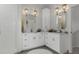 Bright bathroom featuring dual vanities, modern fixtures, and ample storage, perfect for a growing Gathering at 5234 Foxhall Ct, Weeki Wachee, FL 34607