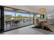 Elegant dining area with sliding glass doors showcasing beautiful views and natural light at 5234 Foxhall Ct, Weeki Wachee, FL 34607