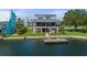 Stunning waterfront home with private dock and lush landscaping offering serene coastal living at 5234 Foxhall Ct, Weeki Wachee, FL 34607
