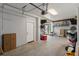 Spacious garage with ample storage, door to outside, and plenty of room for parking and projects at 5234 Foxhall Ct, Weeki Wachee, FL 34607