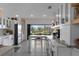 Bright and airy kitchen with modern white cabinetry and natural light, perfect for cooking at 5234 Foxhall Ct, Weeki Wachee, FL 34607