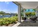 Inviting patio with seating area and waterfront view at 5234 Foxhall Ct, Weeki Wachee, FL 34607