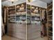 Custom walk-in closet features built-in shelving, drawers, and ample storage space at 5234 Foxhall Ct, Weeki Wachee, FL 34607