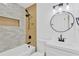 Elegant bathroom features modern fixtures, stylish tile work, and a soaking tub at 5753 2Nd N Ave, St Petersburg, FL 33710
