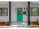 Attractive front exterior showcasing a painted door, updated fixtures and modern landscaping at 5753 2Nd N Ave, St Petersburg, FL 33710