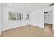 Well-lit room with white walls, hardwood floors, and natural light from windows at 5753 2Nd N Ave, St Petersburg, FL 33710