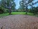 Expansive backyard area offering plenty of space for outdoor activities and gardening at 6339 Delaware Ave, New Port Richey, FL 34653
