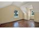 Bedroom with hardwood floors and natural light from two windows at 7089 Goodway, Brooksville, FL 34602