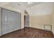 This bedroom features hardwood floors, a closet, and natural lighting from the window at 7089 Goodway, Brooksville, FL 34602