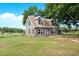 Charming two-story home with a welcoming front yard and lovely curb appeal at 7089 Goodway, Brooksville, FL 34602