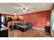 Comfortable living room showcasing an open layout, stylish furnishings, and hardwood floors at 7089 Goodway, Brooksville, FL 34602