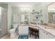 Bathroom boasts granite counters, a vanity area and a tile shower at 7367 Willow Brook Dr, Spring Hill, FL 34606