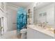 Cozy bathroom features a shower and tub combo, and well-lit mirror at 7367 Willow Brook Dr, Spring Hill, FL 34606