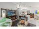 Open living area with a kitchen, living room, and modern decor, perfect for entertaining at 7367 Willow Brook Dr, Spring Hill, FL 34606
