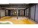 Covered back patio with built-in jacuzzi and view into living areas at 7501 Woodbox Row, Hudson, FL 34667