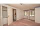 Bedroom featuring carpet, and closet at 7501 Woodbox Row, Hudson, FL 34667