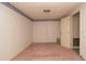 Bedroom with neutral walls, carpet, and a closet at 7501 Woodbox Row, Hudson, FL 34667