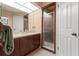 Bathroom featuring a vanity, shower, and neutral colors, offering a clean and comfortable space for personal care at 7512 Heather Walk Dr, Weeki Wachee, FL 34613