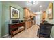 Spacious kitchen offering ample cabinet space, granite countertops, modern appliances, and an adjacent dining area at 7512 Heather Walk Dr, Weeki Wachee, FL 34613