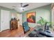 Inviting office space with an elegant desk, chair, and a ceiling fan for a comfortable working environment at 7512 Heather Walk Dr, Weeki Wachee, FL 34613