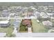 Aerial view of home in a waterfront community featuring a spacious yard outlined in red at 7520 Mako Dr, Hudson, FL 34667