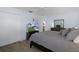 Cozy bedroom featuring a ceiling fan, closet and TV, offering a comfortable retreat at 7520 Mako Dr, Hudson, FL 34667