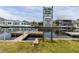 This view of the community's boat ramp shows posted rules by the canal at 7520 Mako Dr, Hudson, FL 34667