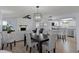 Open dining area showcasing seamless integration with the living room and kitchen at 7520 Mako Dr, Hudson, FL 34667