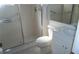 Clean bathroom featuring a glass-enclosed shower, vanity, and tiled floor, offering a functional space at 7600 St. Andrews Blvd # 7600, Weeki Wachee, FL 34613