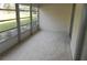 Enclosed lanai area with view of lawn at 7600 St. Andrews Blvd # 7600, Weeki Wachee, FL 34613