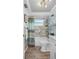 Updated bathroom with tub, shower and tiled shower wall at 8021 Wildflower Row, Hudson, FL 34667