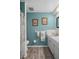 Bright bathroom showcasing a well-maintained shower and updated decor at 8021 Wildflower Row, Hudson, FL 34667